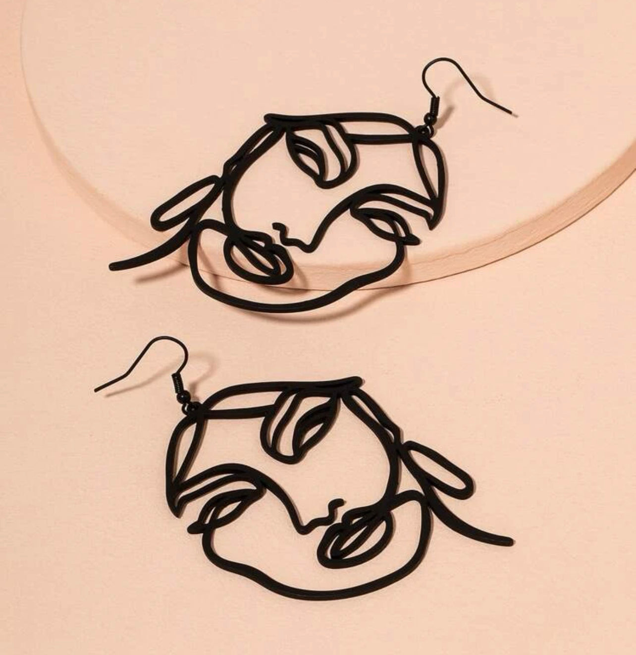 Black Hollow Face Earrings